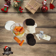 Caja navideña con plato, taza, comida para renos y detalles mágicos